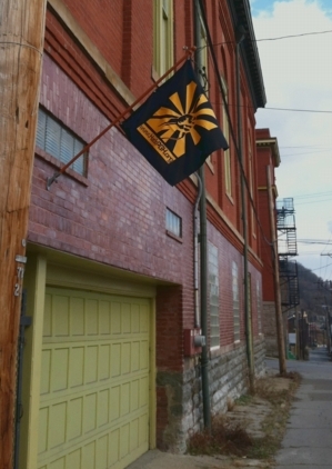HackPittsburgh's flag, flying at an angle over the door