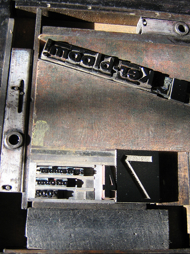 letterpress with text set at a 15 degree angle